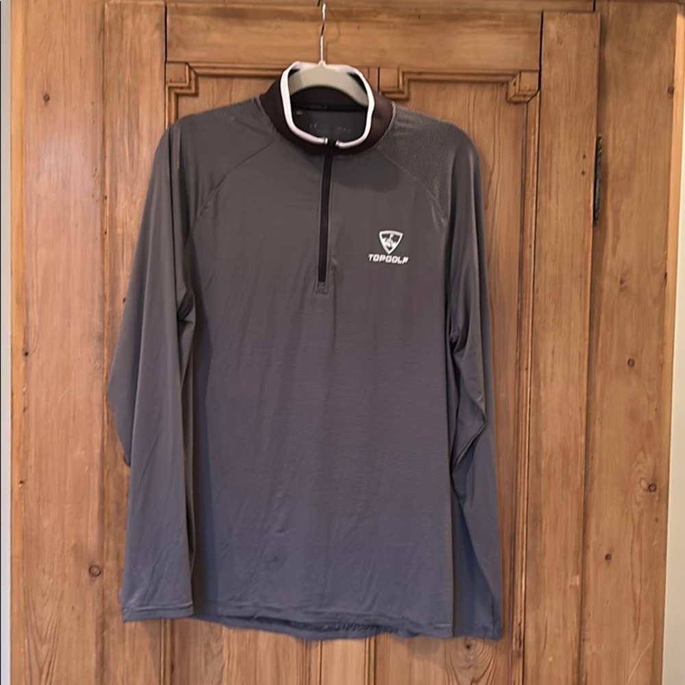Top golf 1/4 zip pullover by Under Armour